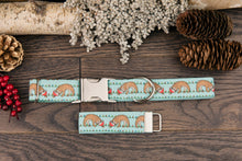 Load image into Gallery viewer, Sloth Dog Collar hanging from Christmas Lights